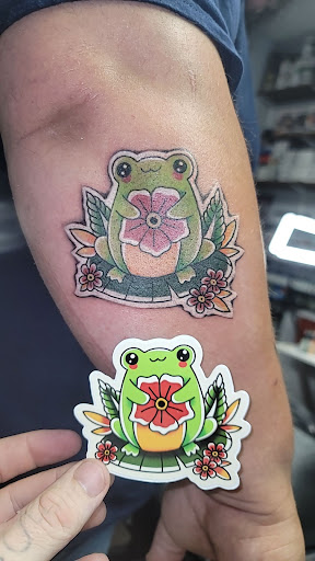 Explore coy fish tattoo ideas, creative tattoo ideas in Lawrenceburg, available at Yellow Rose Tattoo