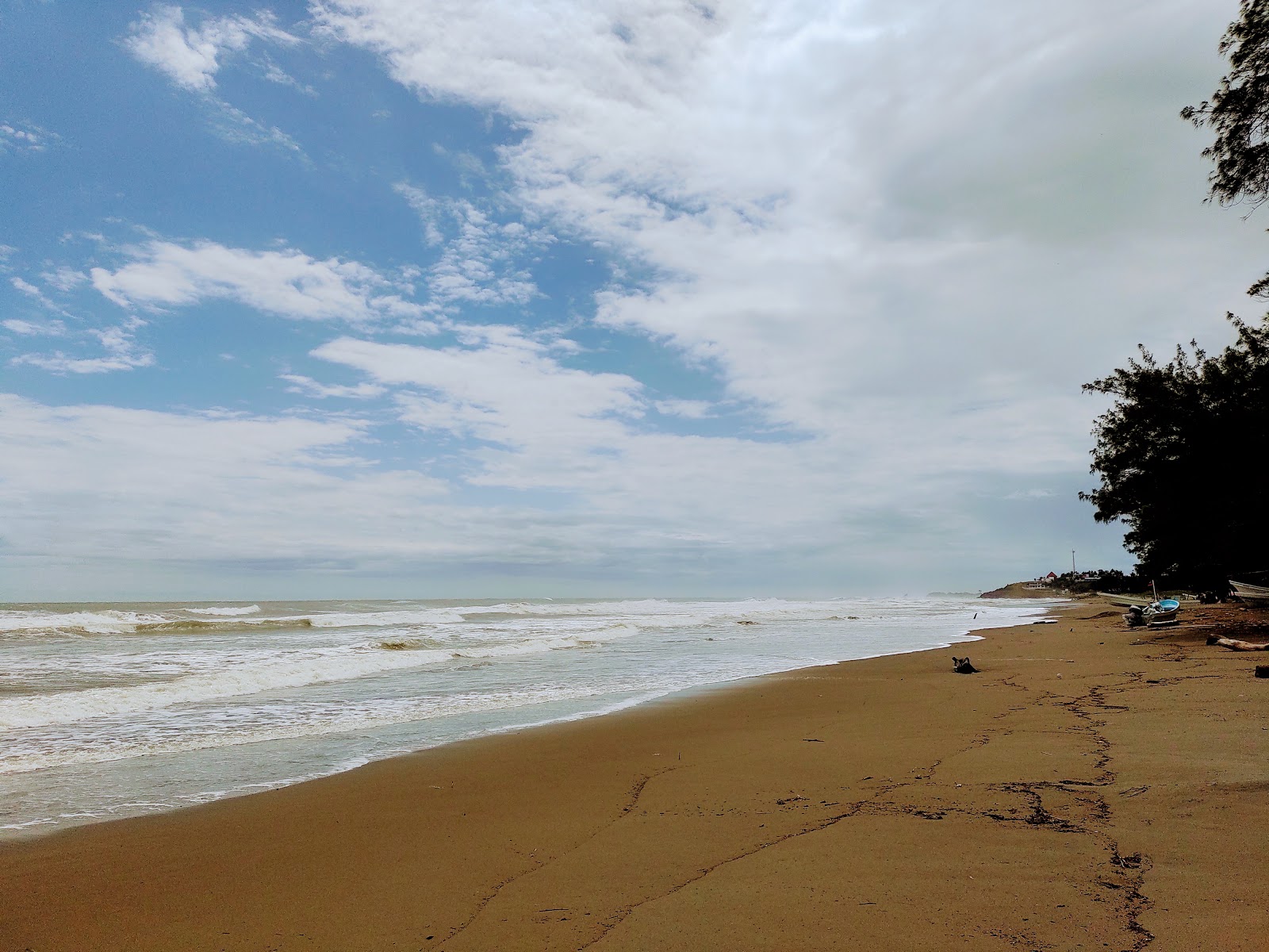 Palma Sola Beach的照片 带有碧绿色纯水表面