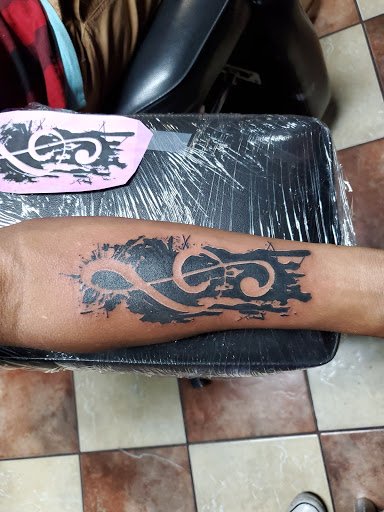 Explore cute flower tattoo ideas, creative tattoo ideas in Bakersfield, available at Monster Ink