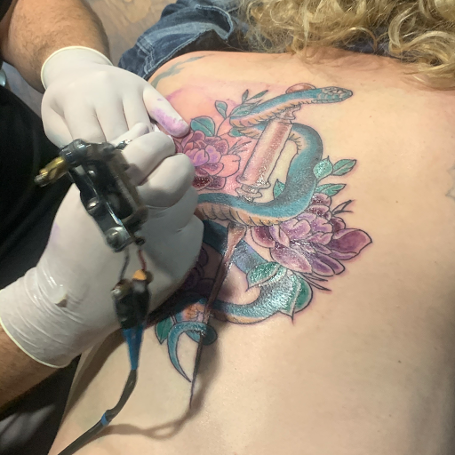 Explore icarus tattoo ideas, creative tattoo ideas in Denison, available at Crossroads Tattoo Studio