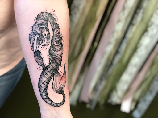 Explore the world is yours tattoo ideas, creative tattoo ideas in Batavia, available at The Pretty Pin-Up Tattoo Parlor