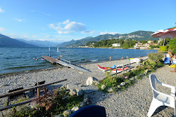 Bellagio Beach'in fotoğrafı geniş bir kıyı şeridi ile birlikte
