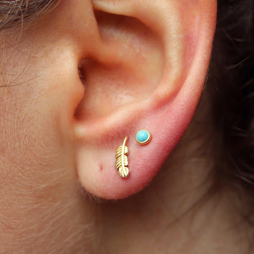 Explore neck tattoo idea men, creative tattoo ideas in Brooklyn, available at Ahimsa Piercing Studio & BVLA Fine Jewelry