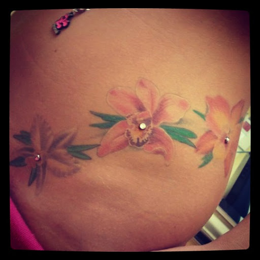 Explore alpha omega tattoo ideas, creative tattoo ideas in Clearwater, available at Moniques Body Art