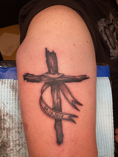 Explore tattoo filler ideas for men, creative tattoo ideas in Ontario, available at Rose & Dagger Ink