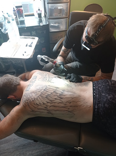 Explore mens cross tattoo ideas, creative tattoo ideas in Galena, available at Emerald Buddha Tattoo