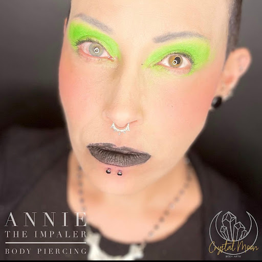 Explore wolf neck tattoo ideas, creative tattoo ideas in Bloomington, available at Crystal Moon Body Arts