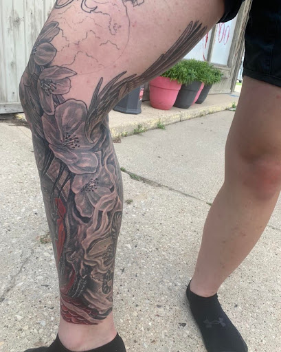 Explore sport tattoo ideas, creative tattoo ideas in Green Bay, available at Darkside Tattoo By Jesse Skywalker