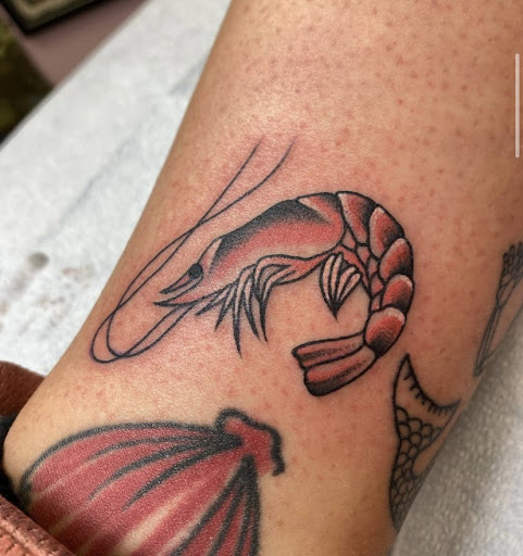 Explore tattoo ideas to cover up a name, creative tattoo ideas in New Orleans, available at TOUGH LOVE TATTOOS