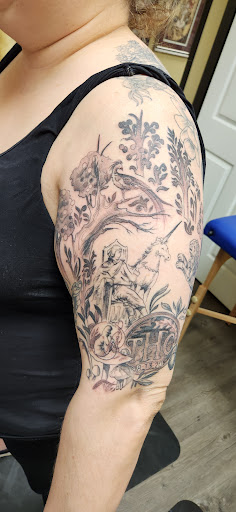 Explore cover up tattoo ideas for leg, creative tattoo ideas in Greenville, available at The Gallery Tattoo Greenville