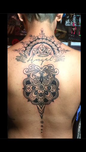 Explore back of neck tattoo ideas, creative tattoo ideas in Duluth, available at Tattoo Fiesta