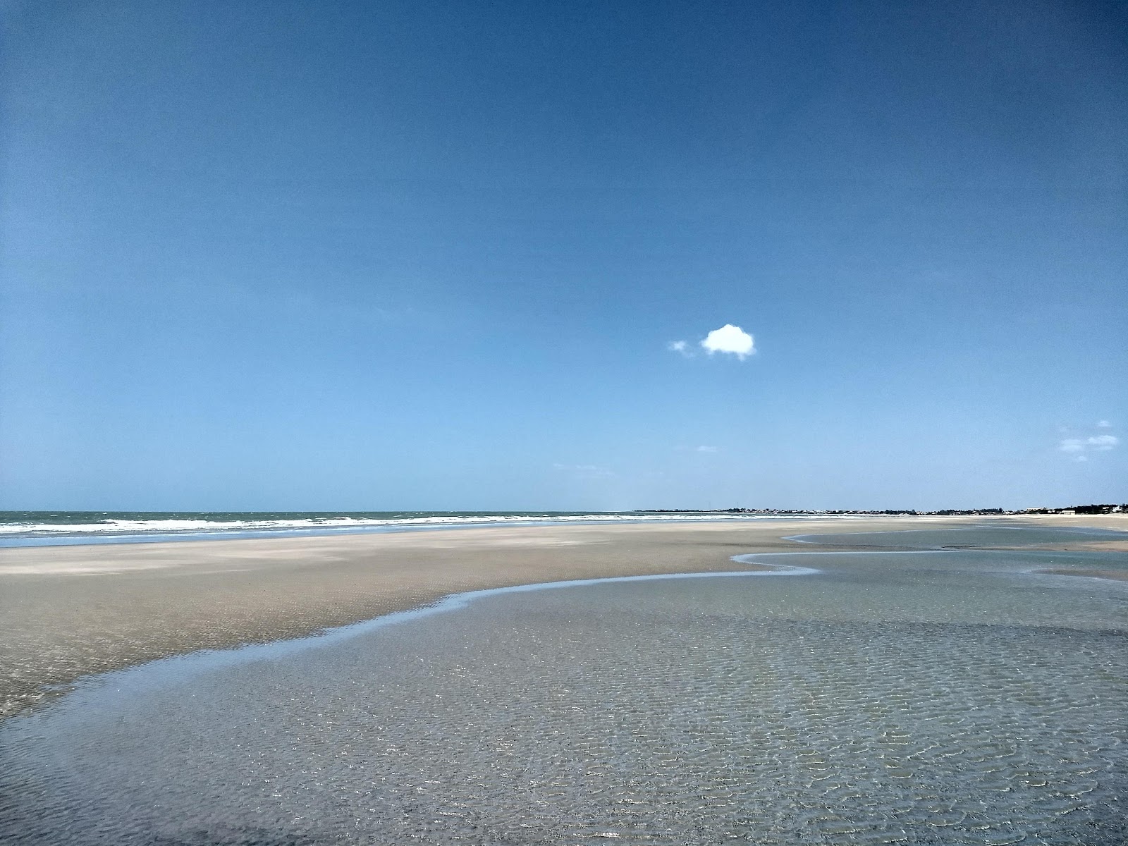 Foto von Praia Peito de Moca und die siedlung