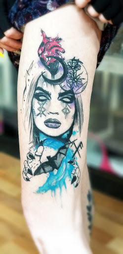 Explore black cat tattoo ideas, creative tattoo ideas in Benton, available at Spectrum Tattoo