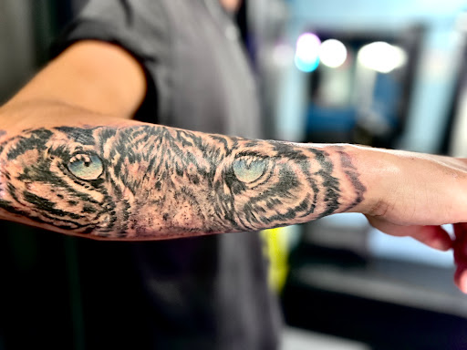 Explore mom and son tattoo ideas, creative tattoo ideas in Merritt Island, available at Surfing Samurai Tattoo