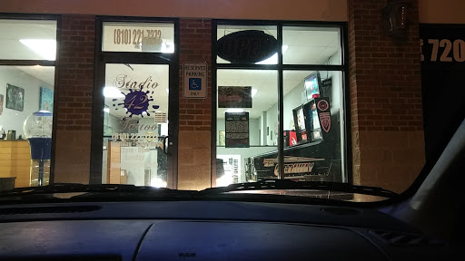 Explore curly hair tattoo ideas, creative tattoo ideas in Flint, available at Studio 42 Tattoo