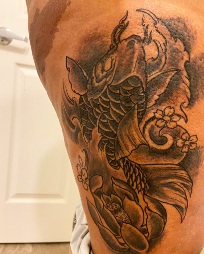 Explore black & white tattoo ideas, creative tattoo ideas in Houston, available at Mafia Ink Tattoo and Piercing