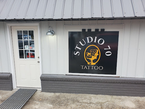 Explore wild tattoo ideas, creative tattoo ideas in Mc Ewen, available at Studio 70 tattoo LLC