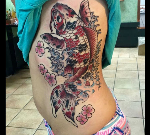 Explore leg tribal tattoo ideas, creative tattoo ideas in Saint Augustine, available at Ms. Deborahs Fountain of Youth Tattoo & Body Piercing