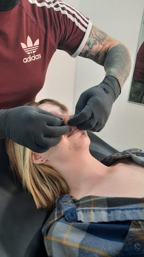 Explore minimalist cat tattoo ideas, creative tattoo ideas in Jensen Beach, available at Treasure Coast Tattoo Co.