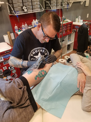 Explore music inspired tattoo ideas, creative tattoo ideas in Crestview, available at Tommy Gunns Tattoo