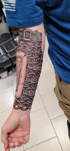 Explore healer tattoo ideas, creative tattoo ideas in Ocoee, available at Slaughterized Ink Tattoo and Piercing Studio