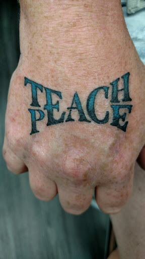 Explore messi tattoo ideas, creative tattoo ideas in Buffalo, available at Signature Ink