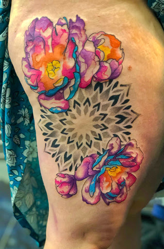 Explore inner bicep tattoo ideas for men, creative tattoo ideas in Addison, available at Cat Tattoo