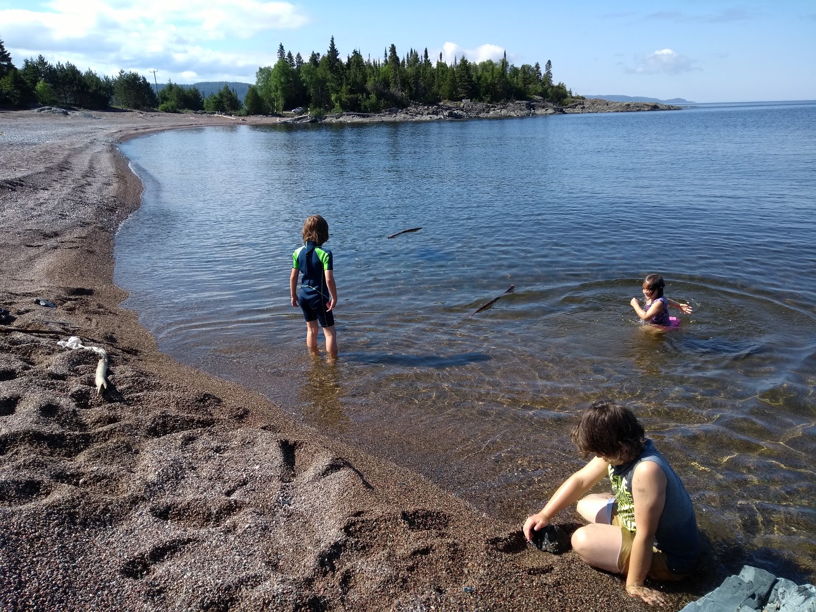 Foto di Government Dock Beach con una superficie del piccoli ciottoli grigi