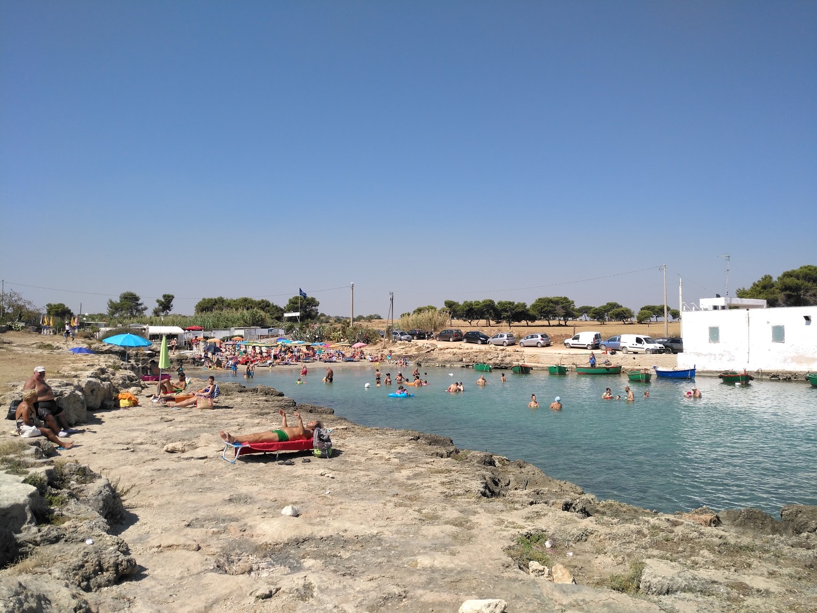 Foto van Cala Fetente beach met blauw puur water oppervlakte