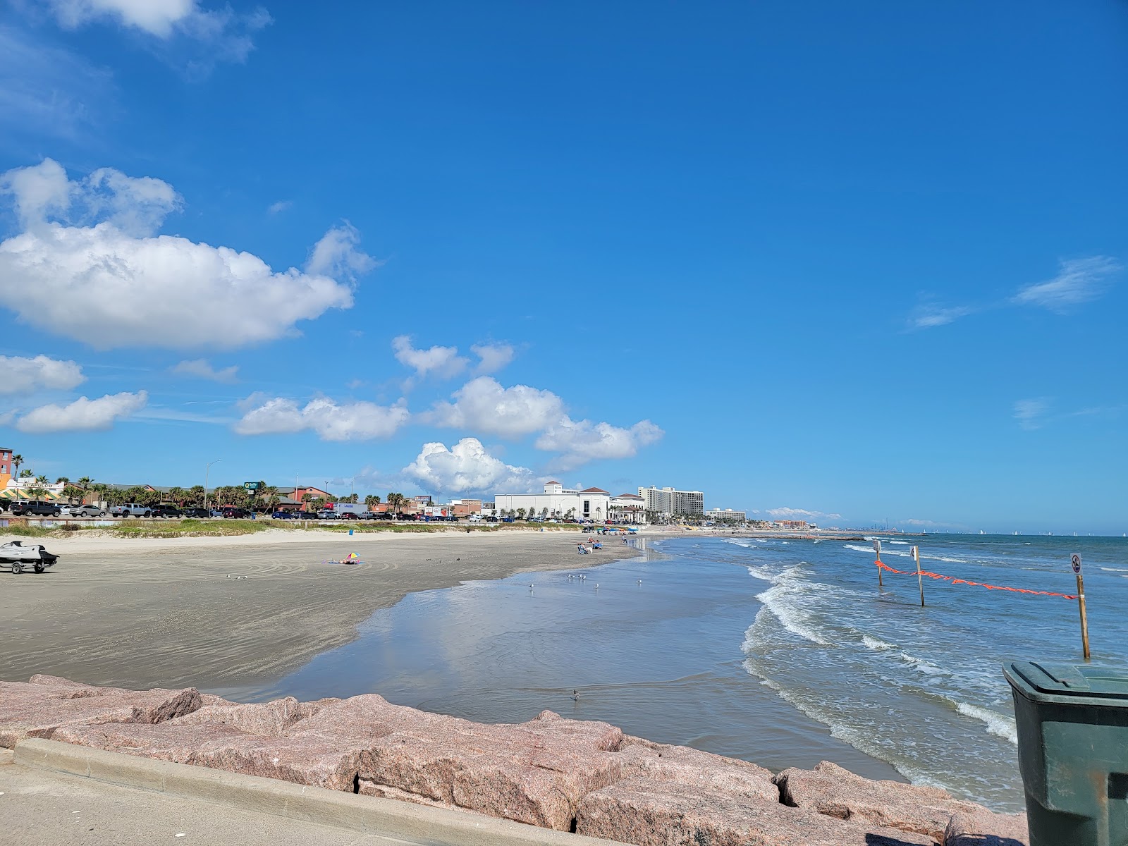 Photo of Galveston beach with long straight shore