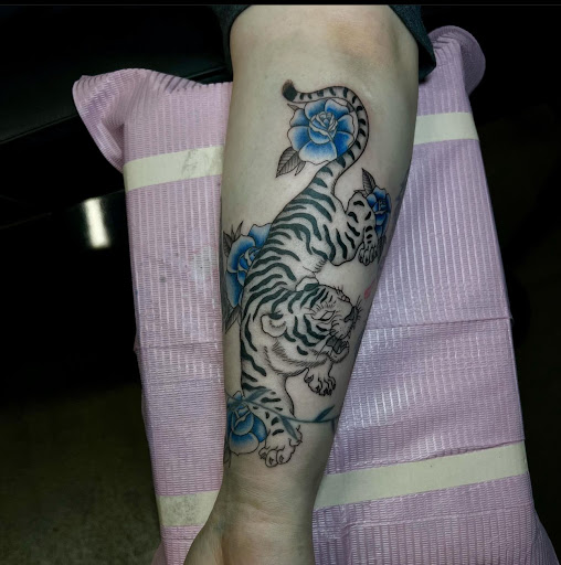 Explore 0311 tattoo ideas, creative tattoo ideas in Bloomington, available at Crystal Moon Body Arts