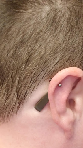 Explore tattoo ideas behind the ear tattoos, creative tattoo ideas in Washington, available at Fattys Tattoos & Piercings Dupont Circle