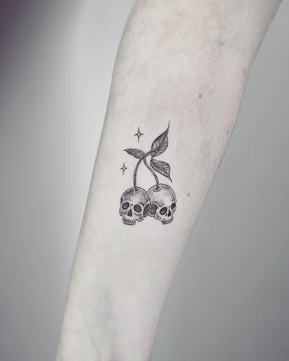 Explore hand skull tattoo ideas, creative tattoo ideas in Huntington, available at Timeless Tattoo Gallery