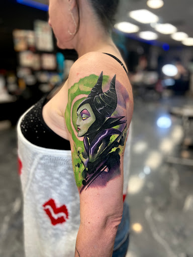 Explore middle finger tattoo ideas, creative tattoo ideas in Mesa, available at Next Wave Tattoos and Piercings