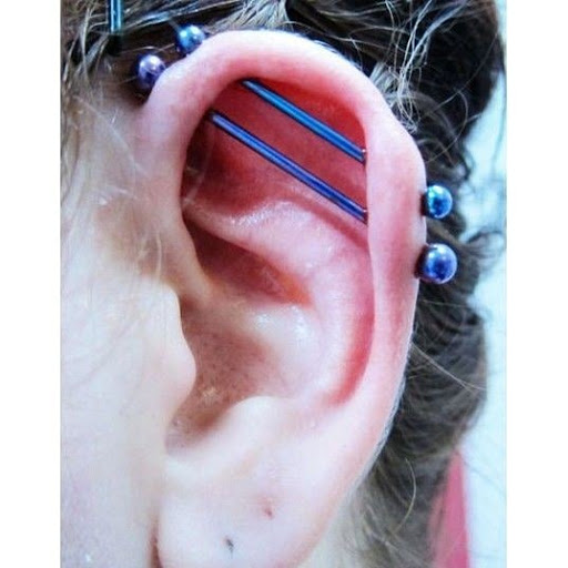 Explore spiderman tattoo ideas, creative tattoo ideas in Elko, available at Tom Custom Tattoos and Body Piercing Studio