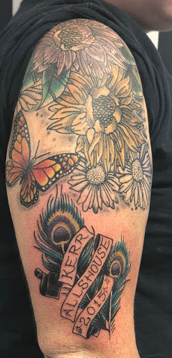 Explore breastfeeding tattoo ideas, creative tattoo ideas in Barberton, available at Magic City Tattoo Company