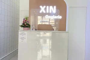 Xin Ongles image