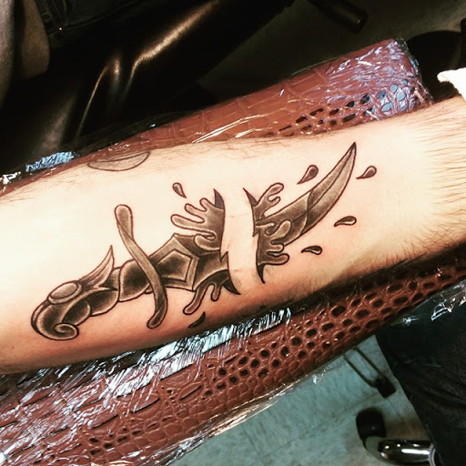 Explore rip tattoos ideas, creative tattoo ideas in Hanover, available at Josiah Morgan Tattooer