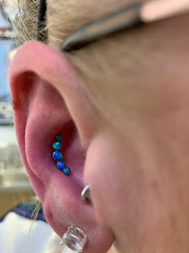 Explore alcohol tattoo ideas, creative tattoo ideas in Brownsburg, available at Chris Summers Body Piercing