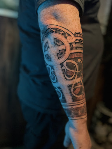 Explore logging tattoo ideas, creative tattoo ideas in Hudson, available at The Bohemian Social Club