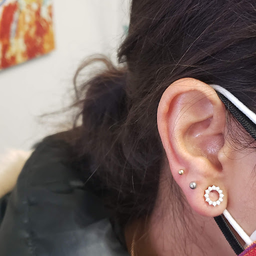 Explore tattoo ideas for guys back, creative tattoo ideas in Bellevue, available at Just Your Ears Piercing & Permanent Jewelry Studio