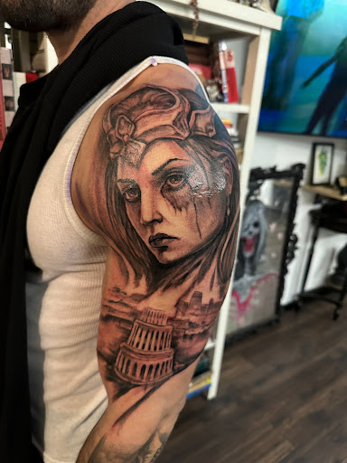 Explore tattoo ideas female thigh, creative tattoo ideas in East Northport, available at Cow Harbor Tattoo and Art