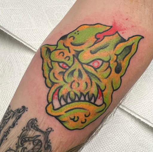 Explore spartan helmet tattoo ideas, creative tattoo ideas in Muskogee, available at Spurlocks Emporium