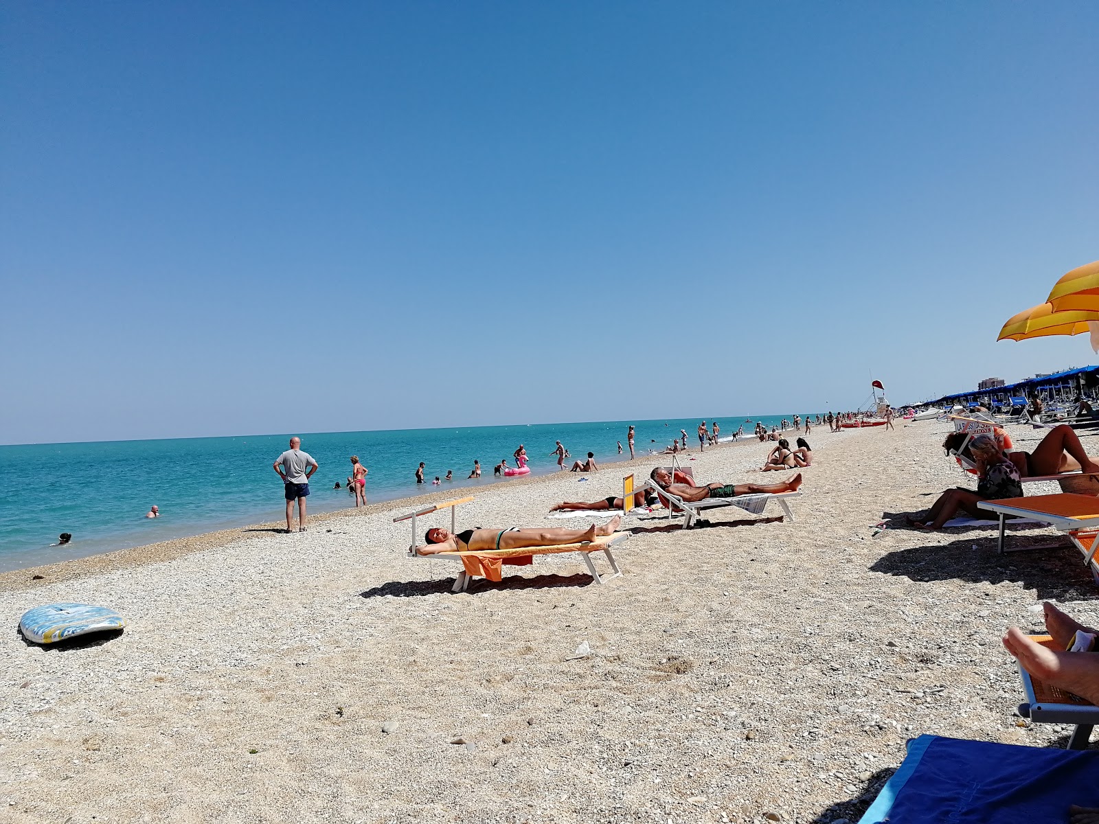 Valokuva Spiaggia Libera Marcelliista. pinnalla turkoosi puhdas vesi:n kanssa