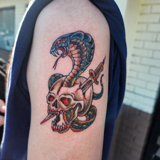 Explore upper arm tattoo ideas, creative tattoo ideas in Augusta, available at Mr. Tattoo