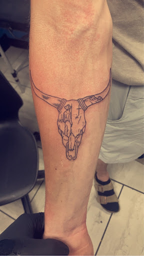 Explore black and white sleeve tattoo ideas, creative tattoo ideas in Foley, available at Symbolic Ink Tattoo Studio