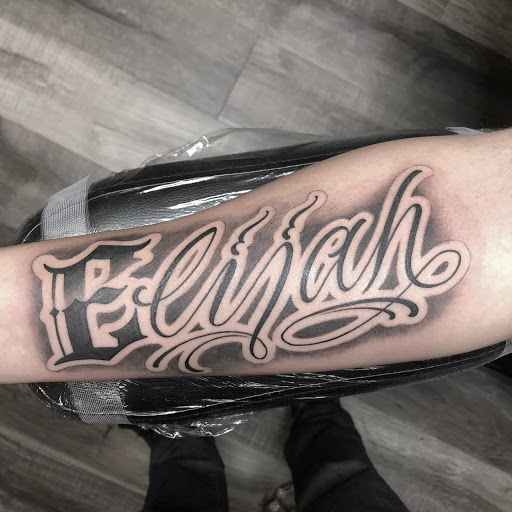 Explore small alien tattoo ideas, creative tattoo ideas in Savannah, available at Tramp Art Studios