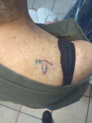 Explore crystal ball tattoo ideas, creative tattoo ideas in Bradenton, available at Memory Lane Tattoo Co.