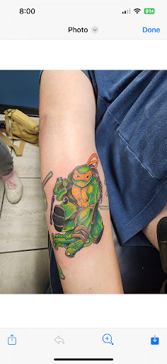 Explore lioness tattoo ideas for females, creative tattoo ideas in Foley, available at Symbolic Ink Tattoo Studio