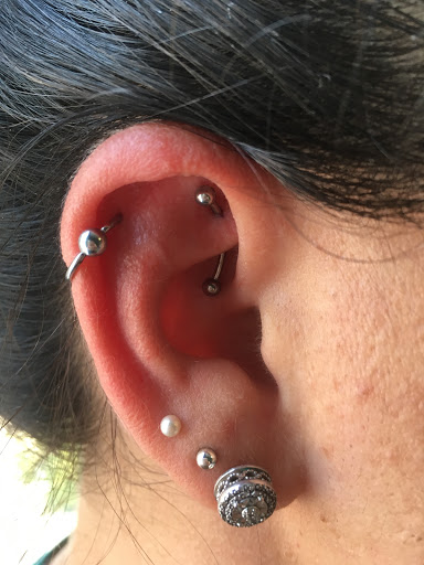 Explore cute cover up tattoo ideas, creative tattoo ideas in Kent, available at War Horse Ink